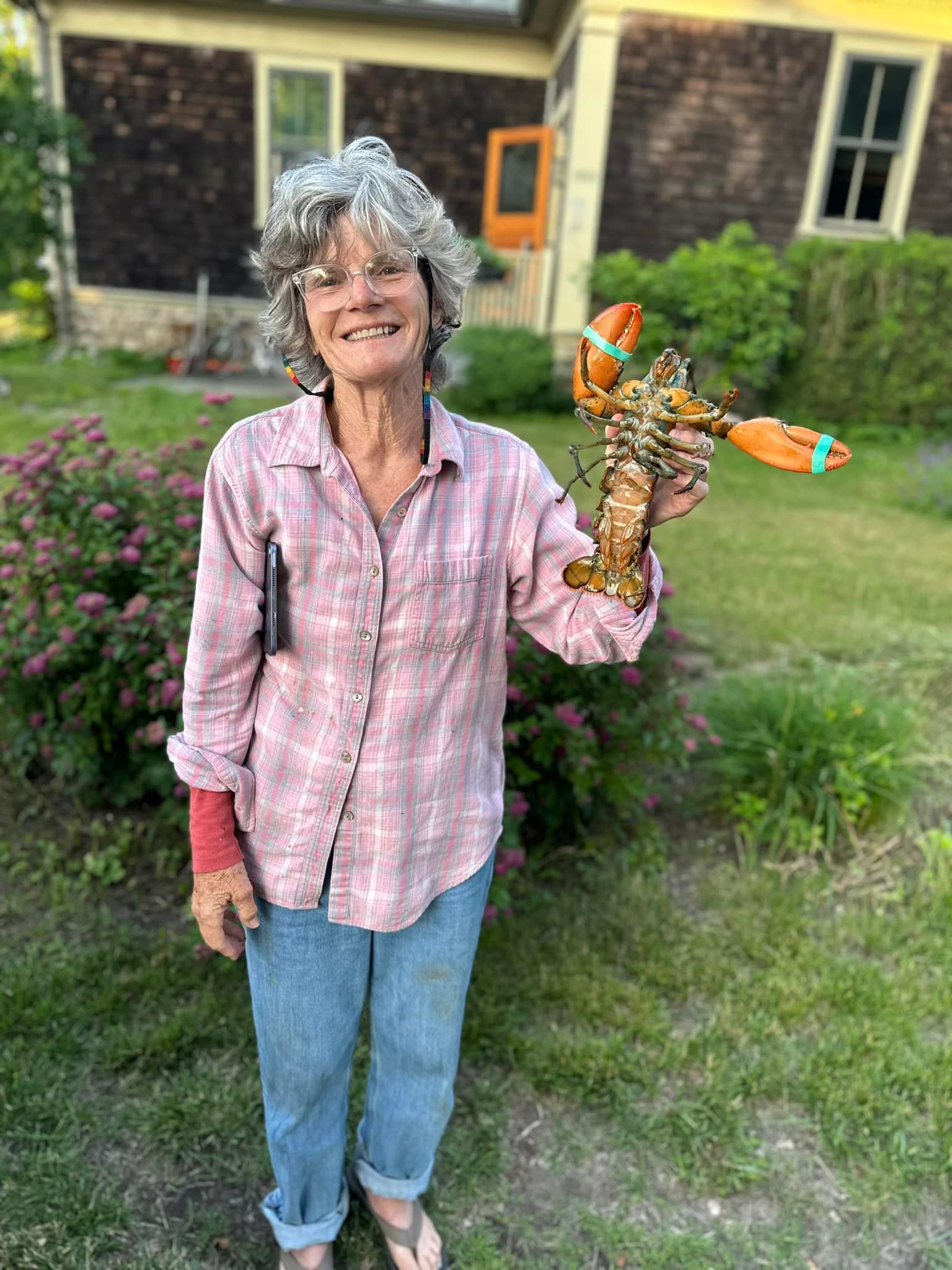 Carol Perry holding a lobster