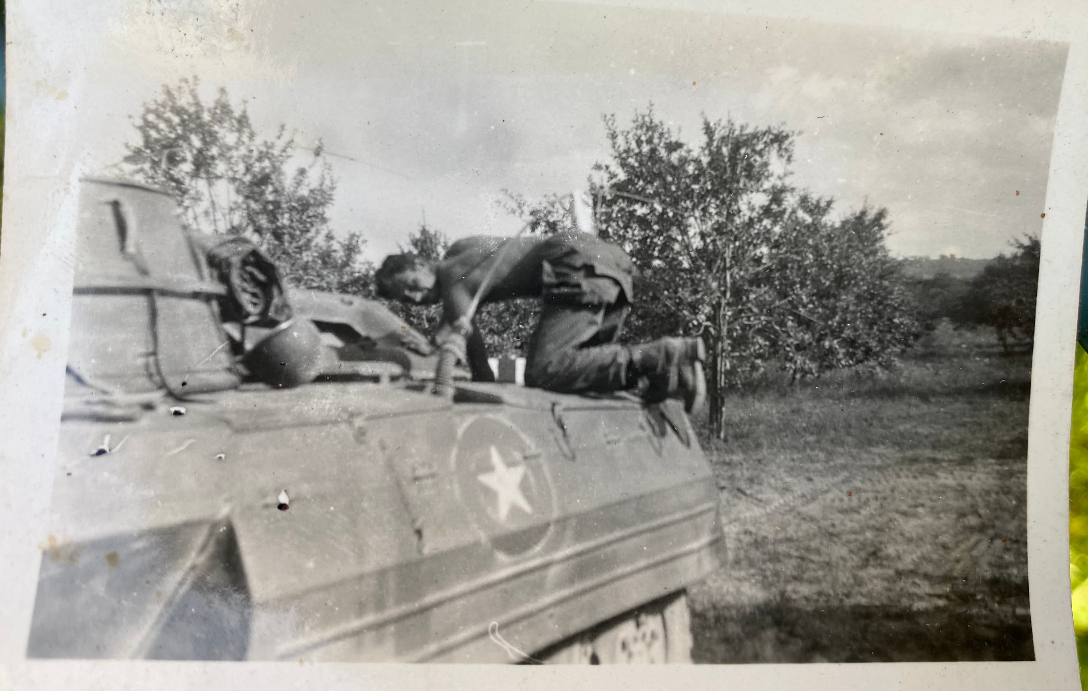 WWII soldier on armored vehicle