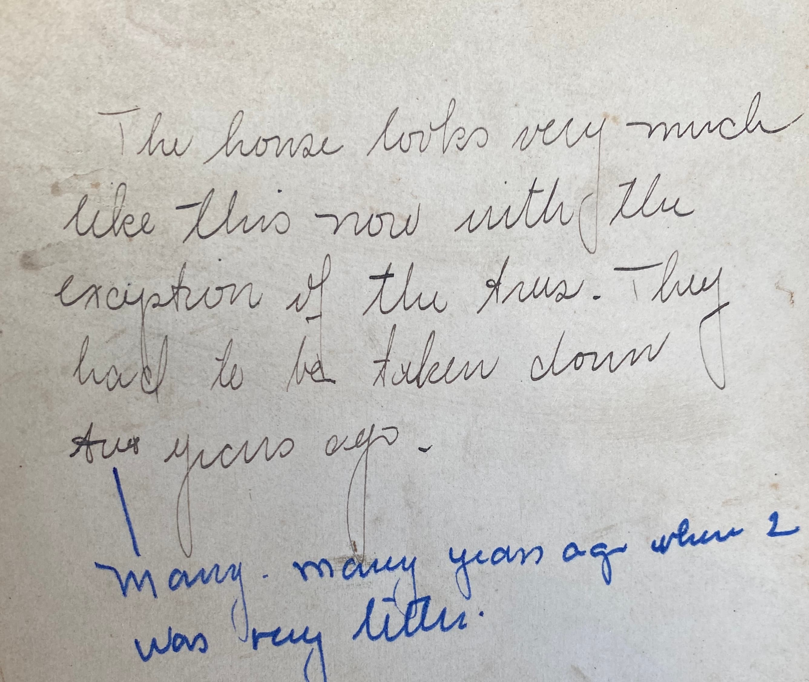 Back of homestead photo with childhood memory note