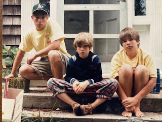 John, Patrick, and Perry. The front steps on Drift Road, by the lane.